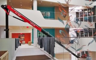 A specialty lift passes through the 5 story space to install the atrium sculpture.