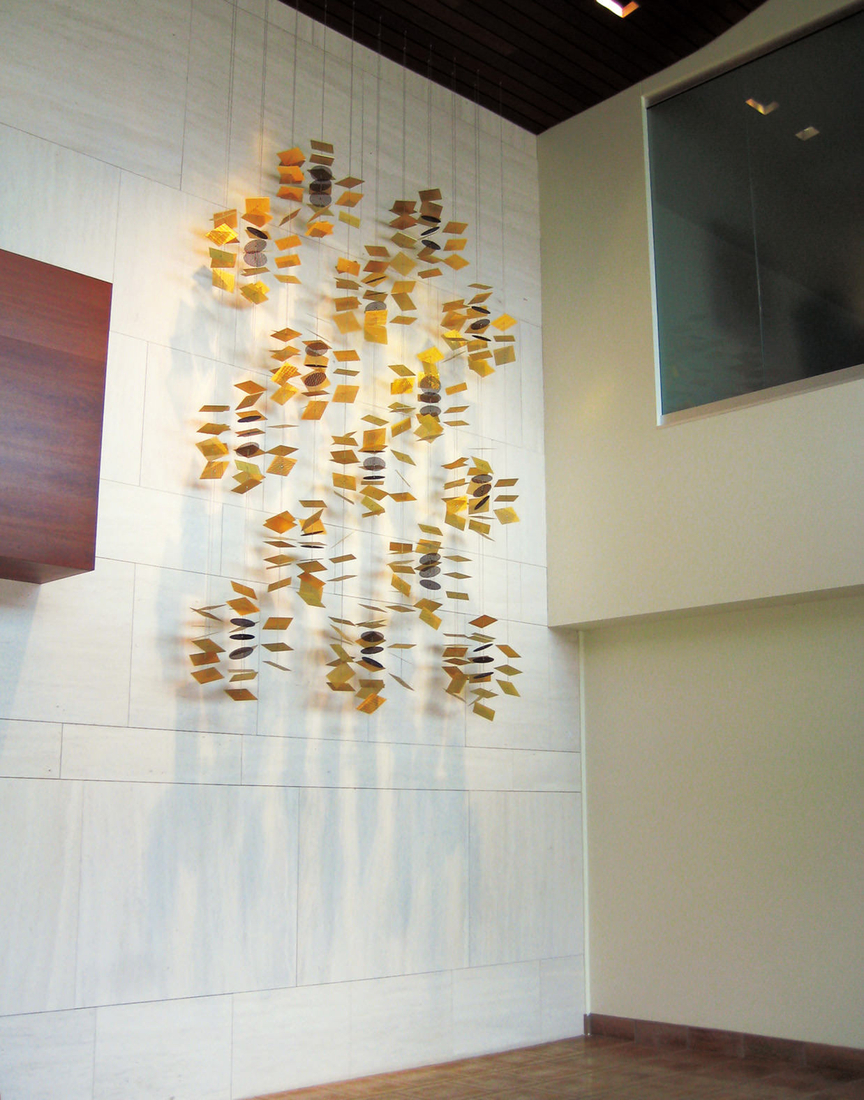 Alhambra Archetype gold corporate art wall sculpture by Talley Fisher.