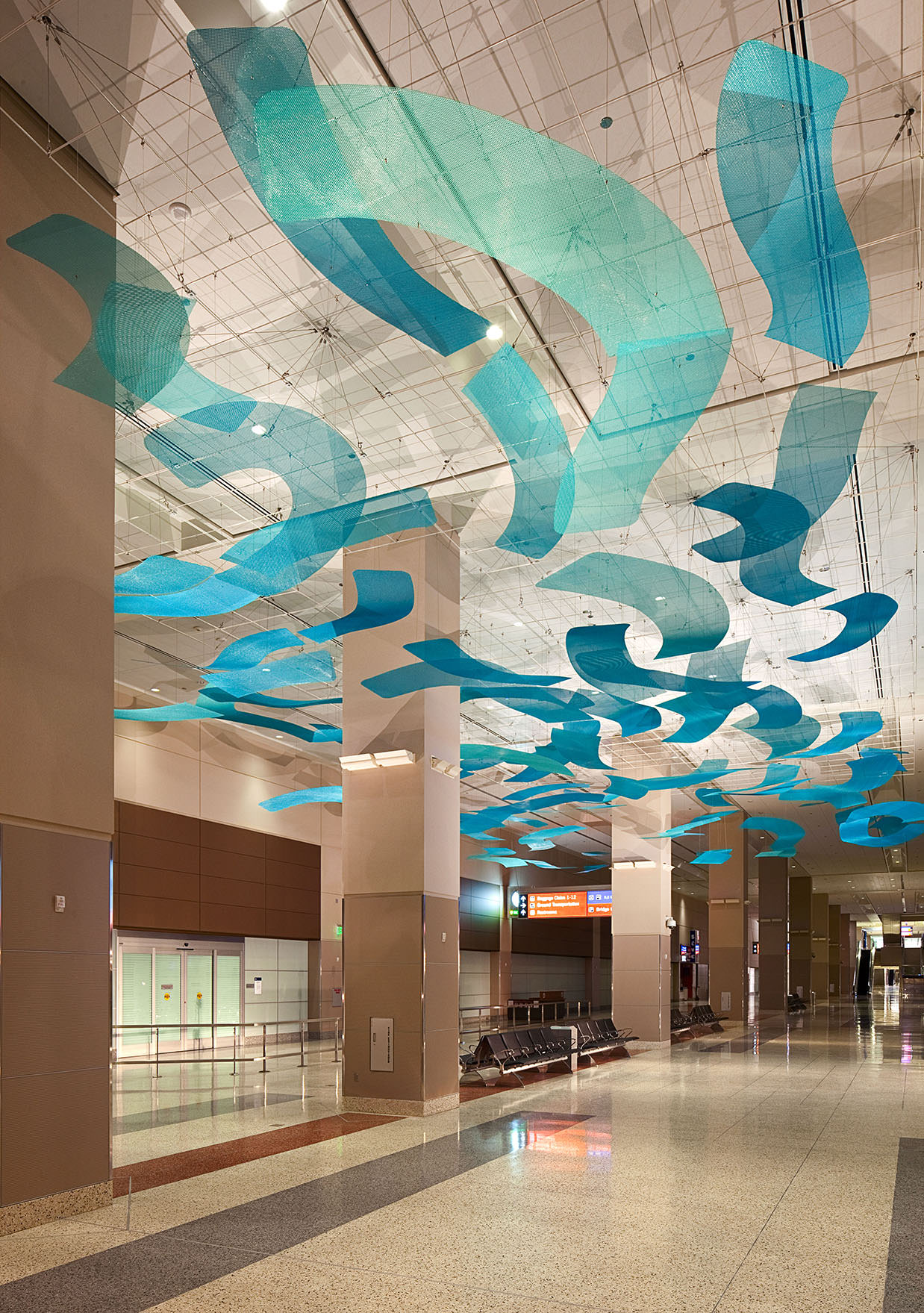 Blue Arroyo, public art sculpture by Talley Fisher in McCarran International Airport.