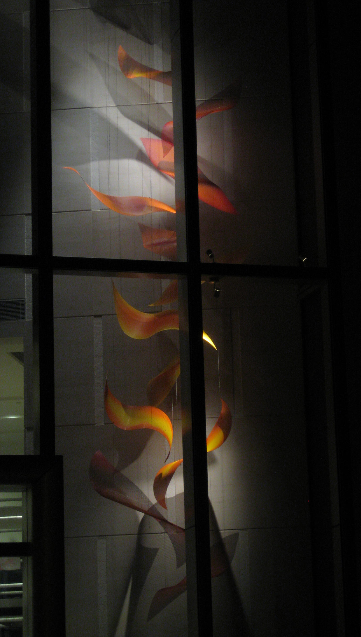 Night view of Talley Fisher's sculpture, Harbour Magic,The Sail at Victoria Road