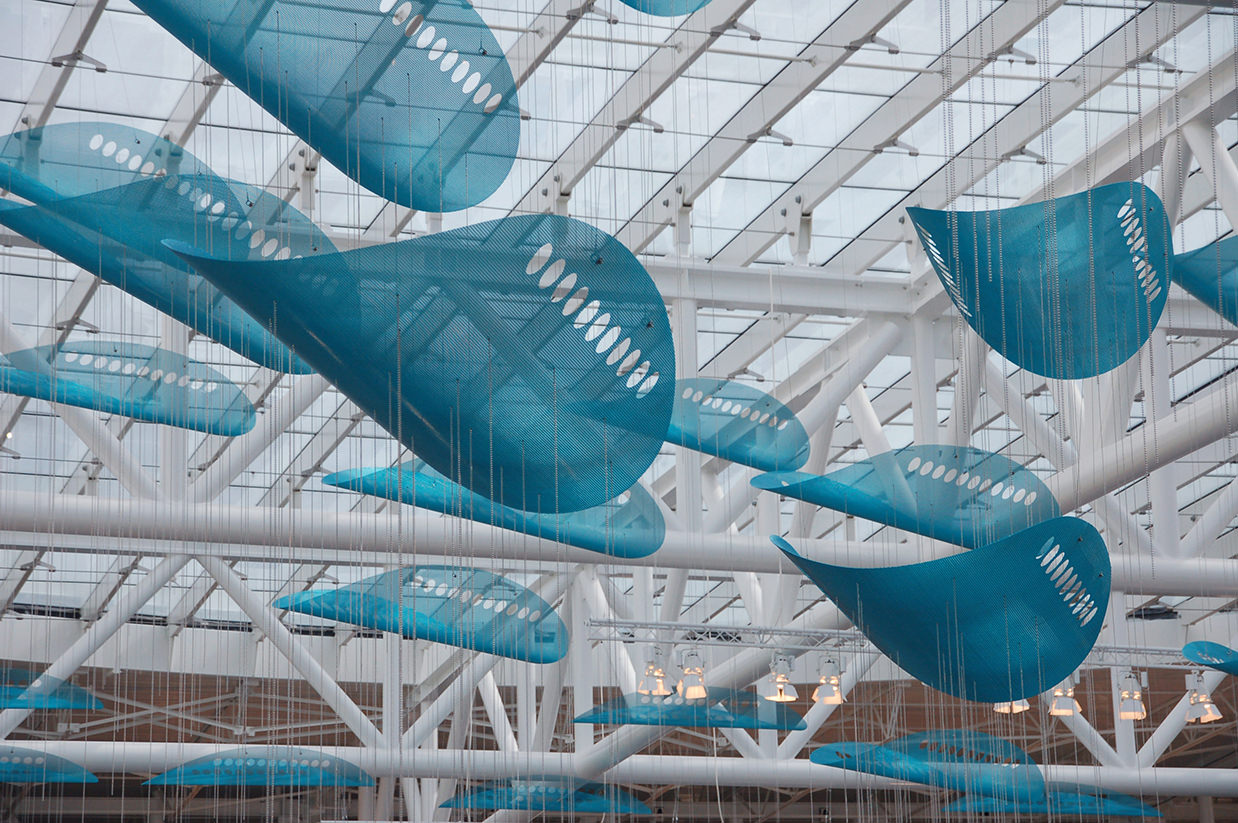 Large blue elements of JetStream, suspended sculpture by Talley and Rob Fisher in Indianapolis International Airport