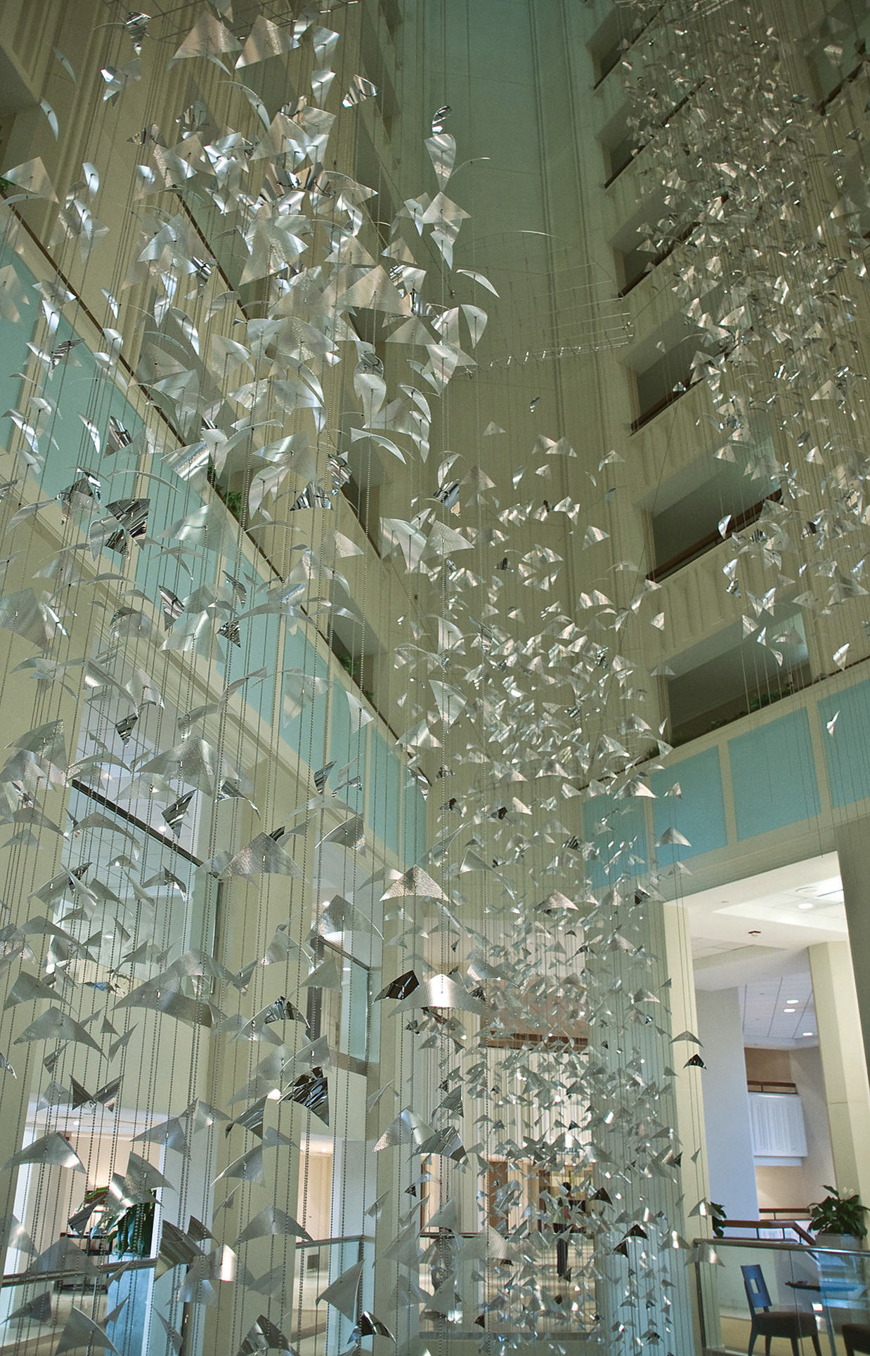 Talley Fisher's Migration hospitality art sculpture in the atrium of Buena Vista Palace Resort