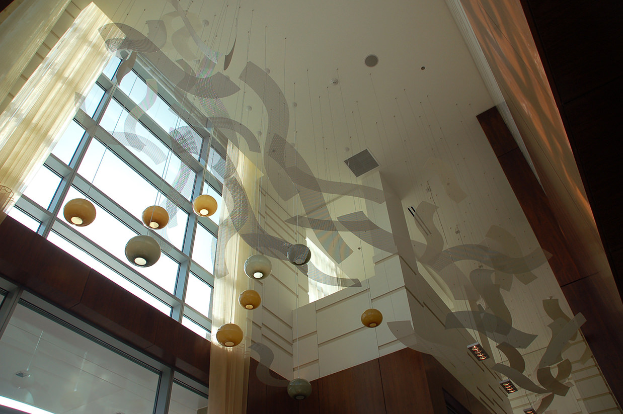 Rhythm of the Rails suspended art installation by Talley Fisher in the lobby of Residence Inn, Potomac Yards