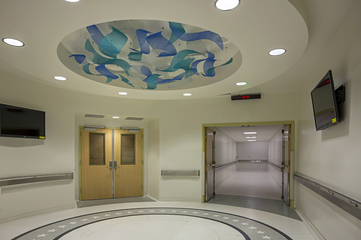 Ripples healthcare art suspended sculpture by Talley Fisher in a rotunda in US Naval Hospital, Guam