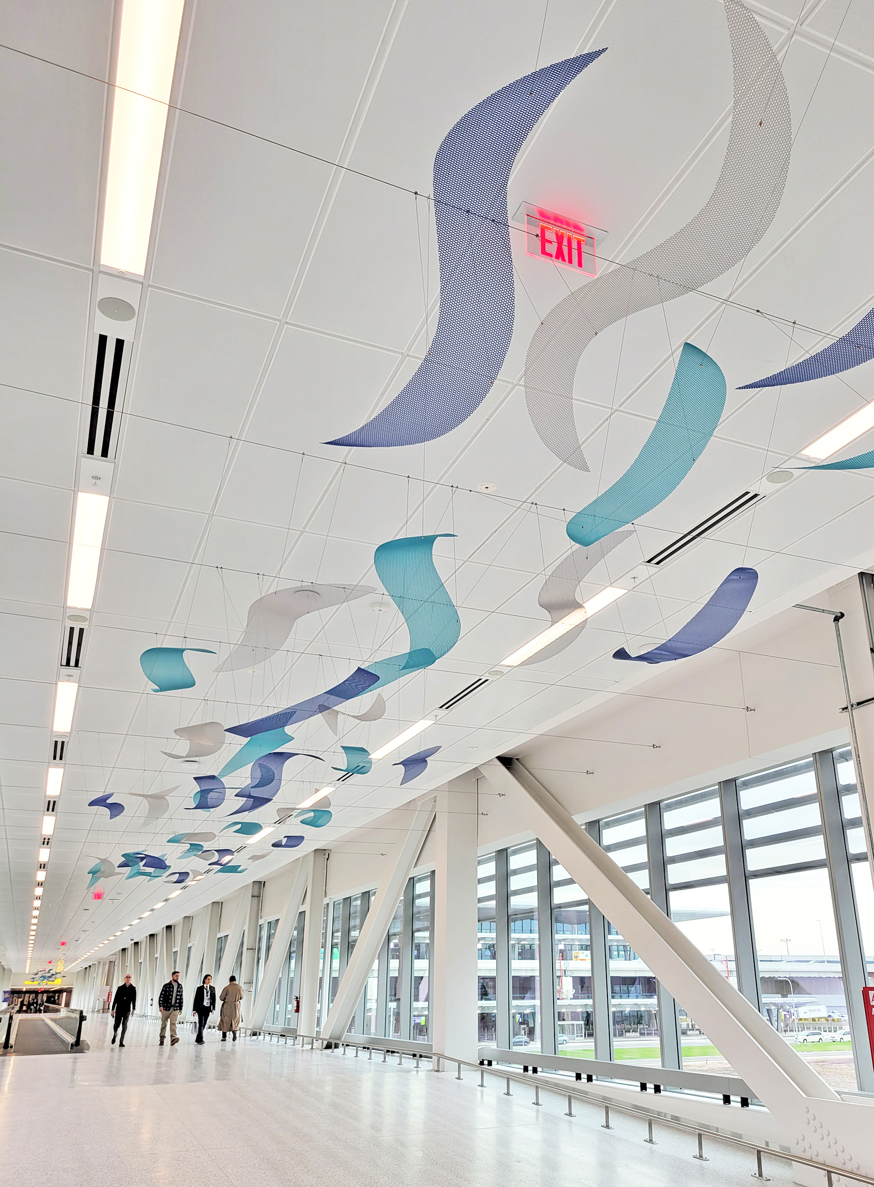 Abstract suspended waves embody the airport artwork theme of celebrating all things New Jersey.